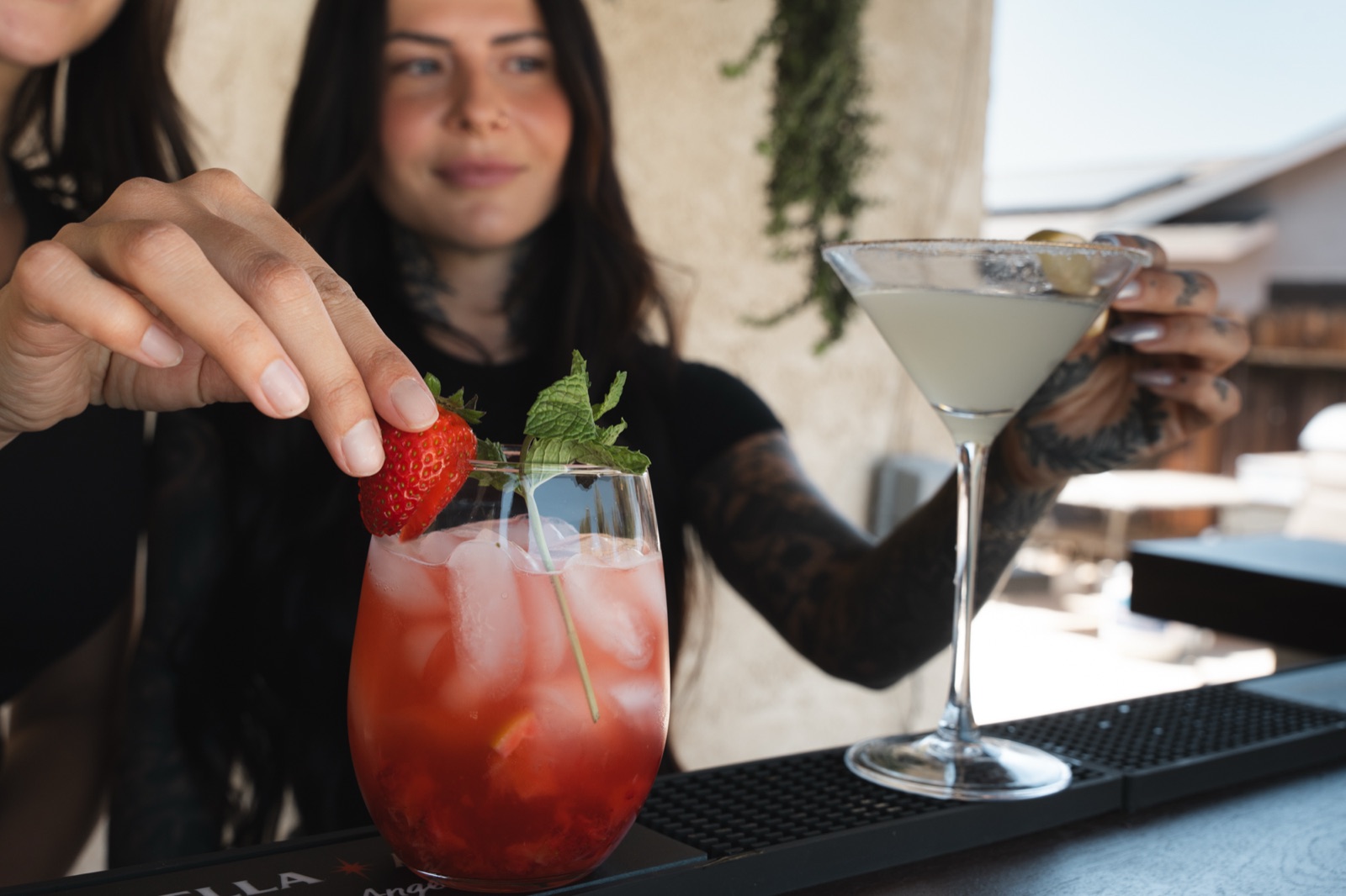 A strawberry-mint refresher getting its garnish